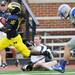 Michigan senior quarterback Denard Robinson runs the ball in for a touchdown minus a shoe in the third against Air Force at Michigan Stadium on Saturday. Melanie Maxwell I AnnArbor.com